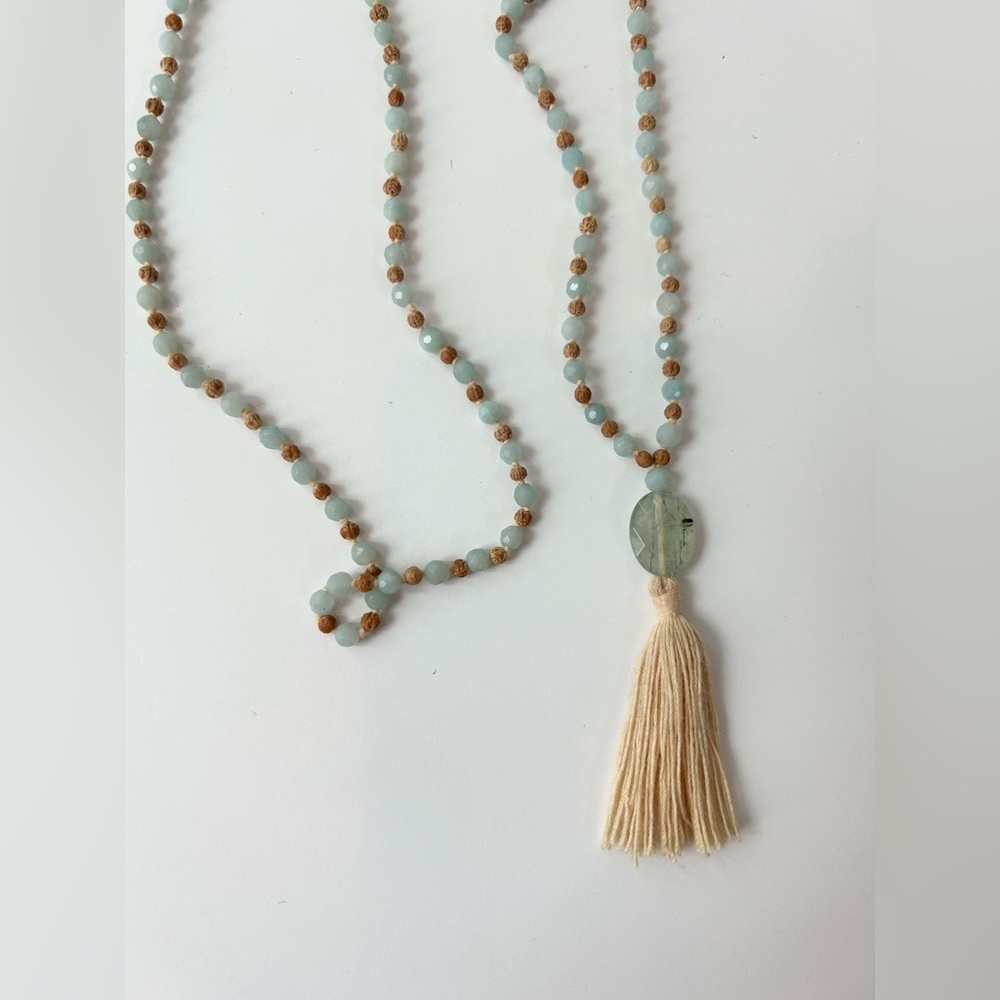 Mala necklace. Semi precious faceted stones
